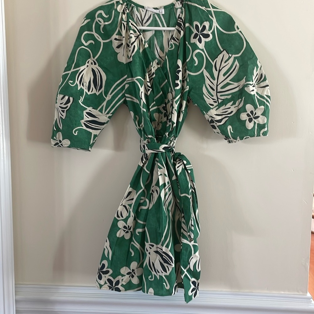 Women’s summer dress from MNG.  Size 4.  Green with floral design. New.
